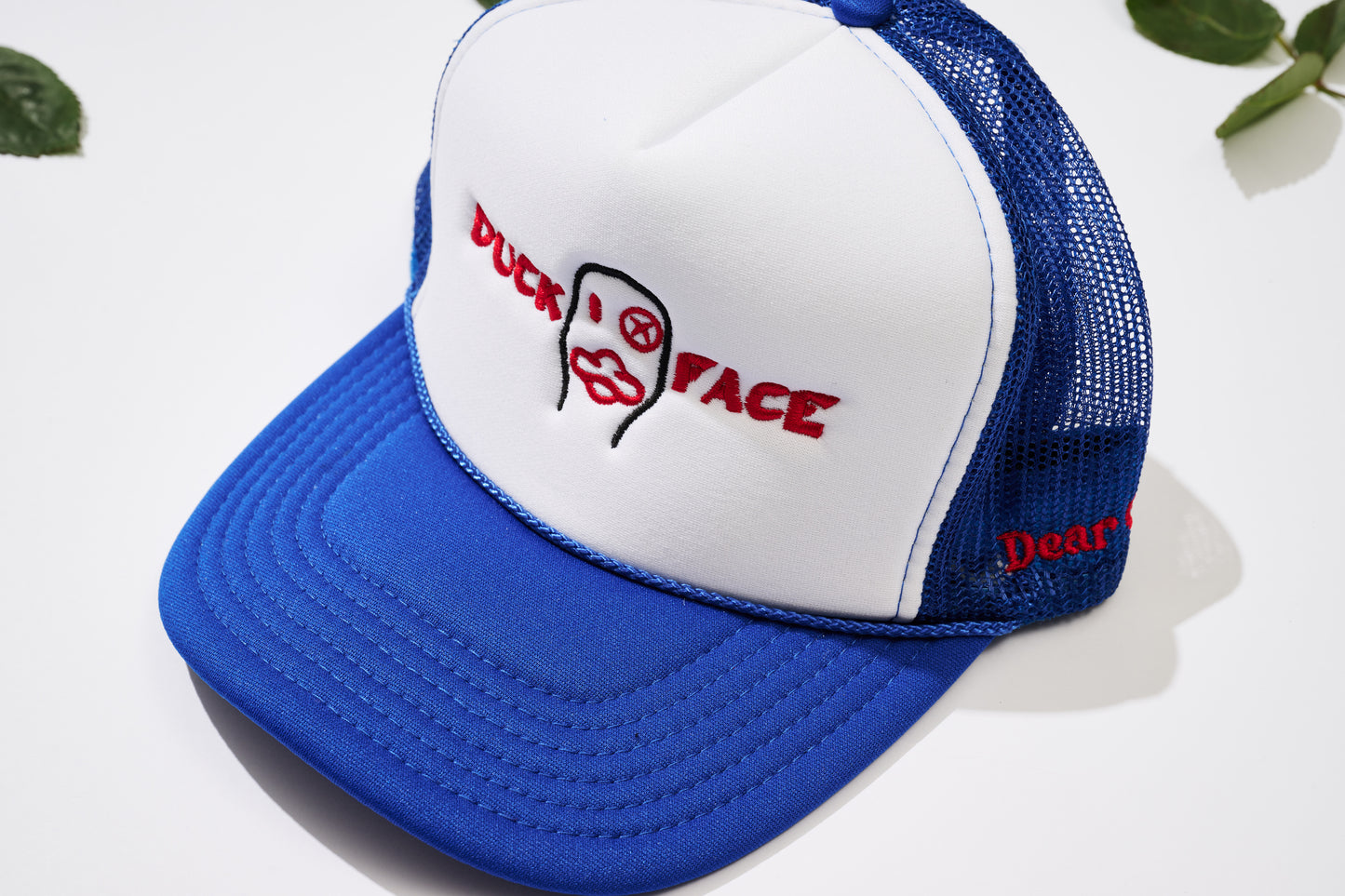 “Duck Face” Trucker hats